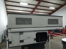Load image into Gallery viewer, Customer Classified: Used 2022 Front Dinette Hawk Four Wheel Camper
