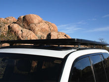 Load image into Gallery viewer, Eezi Awn K9 2.2 Meter Roof Rack System for Toyota Land Cruiser 100 Series
