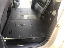 Load image into Gallery viewer, Goose Gear Toyota Tacoma 2005-Present 2nd and 3rd Gen. Double Cab Second Row Seat Delete Plate System Keeping Factory Back Wall
